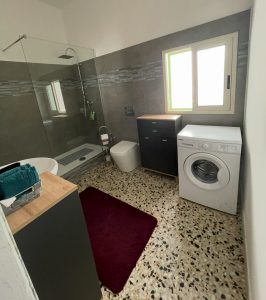 Modern bathroom in seaside home for sale in Specciolla Apulia Italy